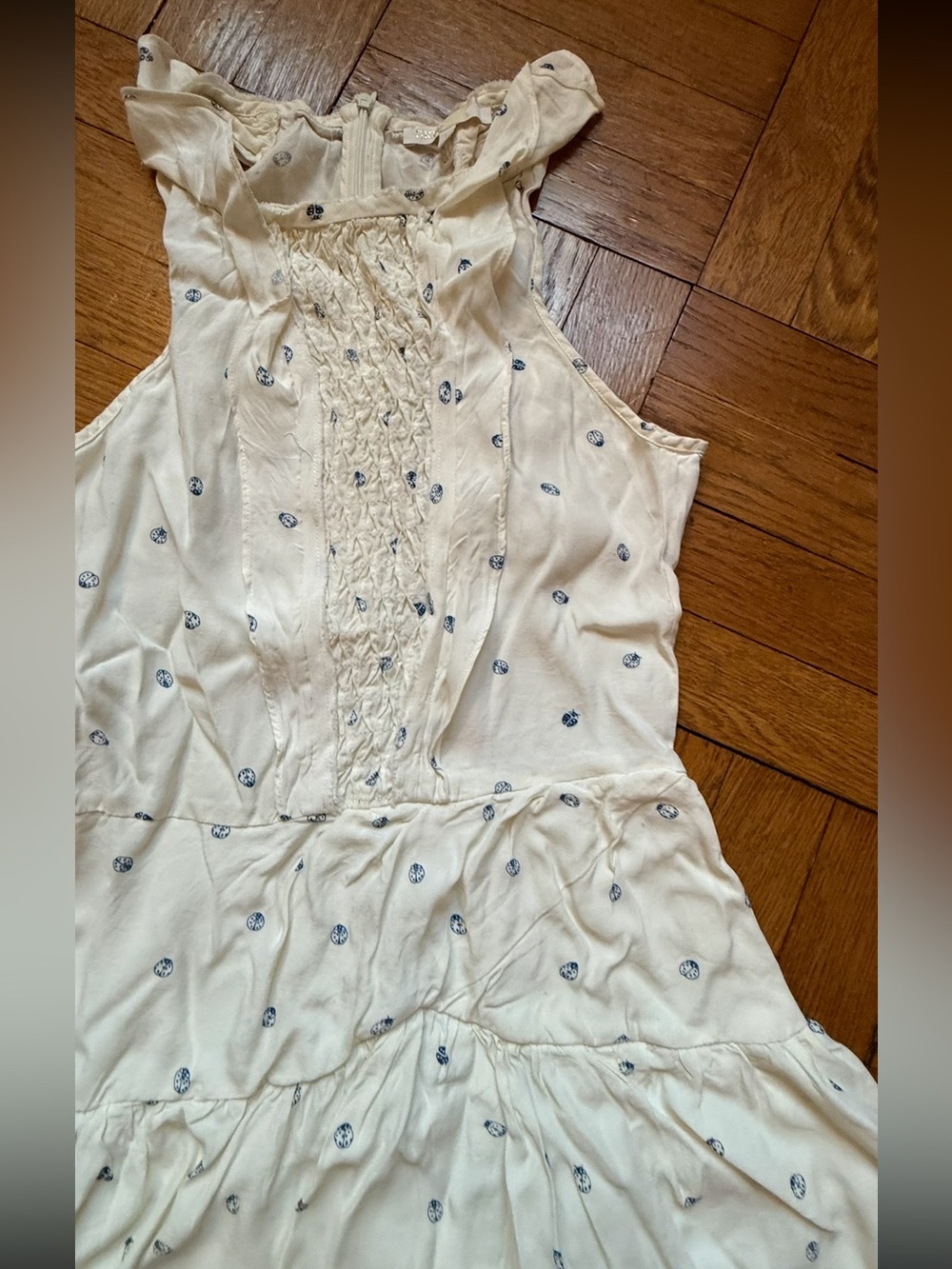 Cute Maje dress w/ smocked front, ruffle detail in ladybug print.100% rayon